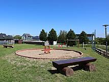 Spielplatz Damgarten, Herderstraße - Sandkasten mit Federwippe